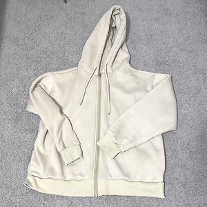 Cream zip up. Thick,  good for fall weather